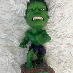 Green and Purple Action Figure Toy bobble head